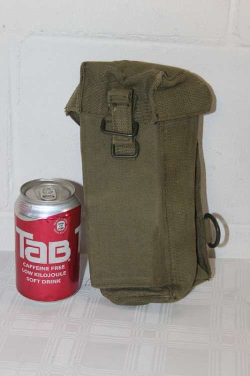 A vintage olive green military water bottle carry bag in very good condition