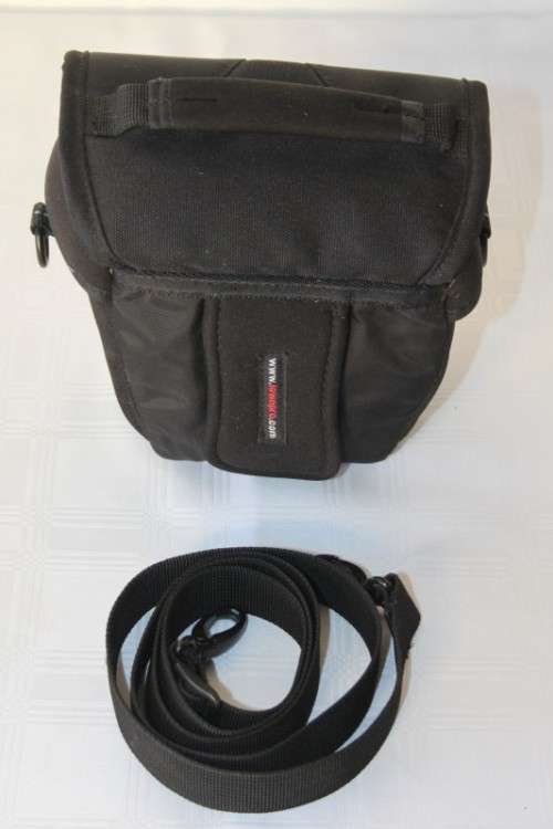 A Fujifilm FinePix S5000 Zoom with a strap in a high quality Lowepro bag