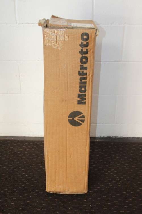 A durable and good quality Manfrotto 190D tripod with a strap in the original box