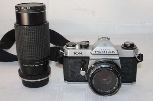 An amazing vintage "Pentax KM" 35mm film camera and a 80-200mm and 50mm lens