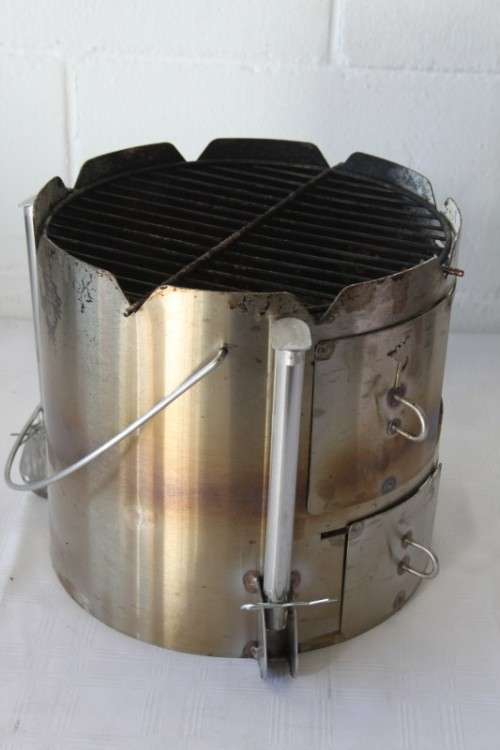 A very useful and portable "Potjie King" outdoor cooking device in its original bag