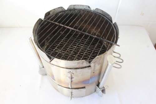 A very useful and portable "Potjie King" outdoor cooking device in its original bag