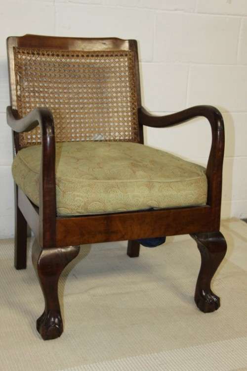 An amazing vintage solid Imbuia "Wicker Back" ball & claw occasional chair