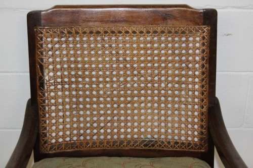 An amazing vintage solid Imbuia "Wicker Back" ball & claw occasional chair