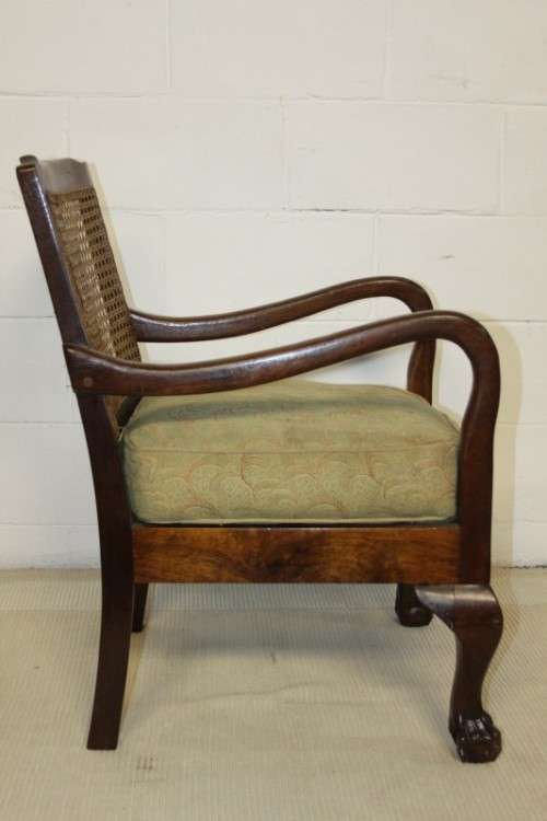 An amazing vintage solid Imbuia "Wicker Back" ball & claw occasional chair