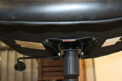 A comfortable faux-leather swivel office/ desk chair - would be ideal for home study