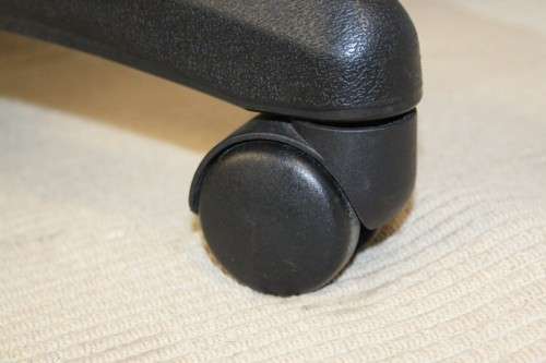 A comfortable faux-leather swivel office/ desk chair - would be ideal for home study