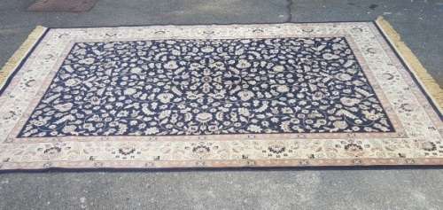 A superb Saudi made navy blue "silky" carpet with a stunning pattern in awesome condition