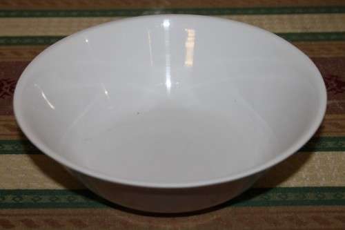 An assortment of plastic plates and bowls - perfect to take on camping trips