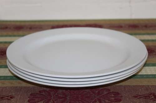 An assortment of plastic plates and bowls - perfect to take on camping trips