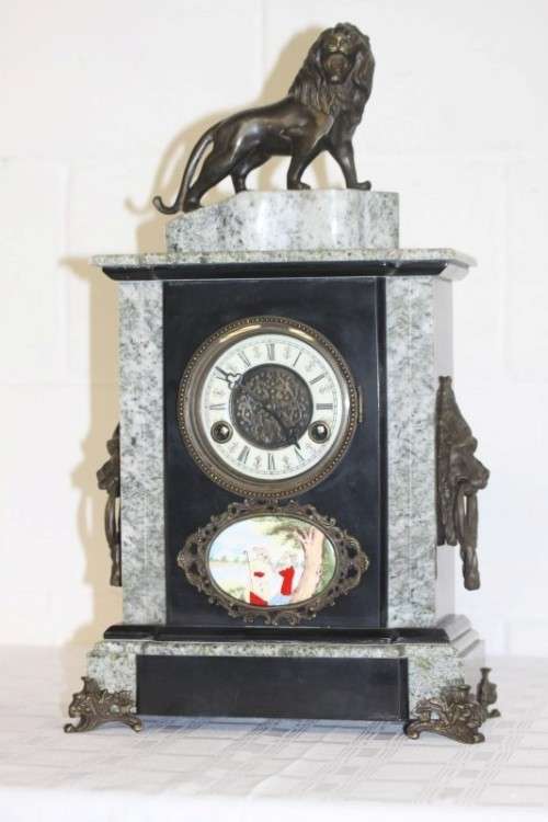 An incredible Italian grey granite & French black slate bronze Lion mantle clock