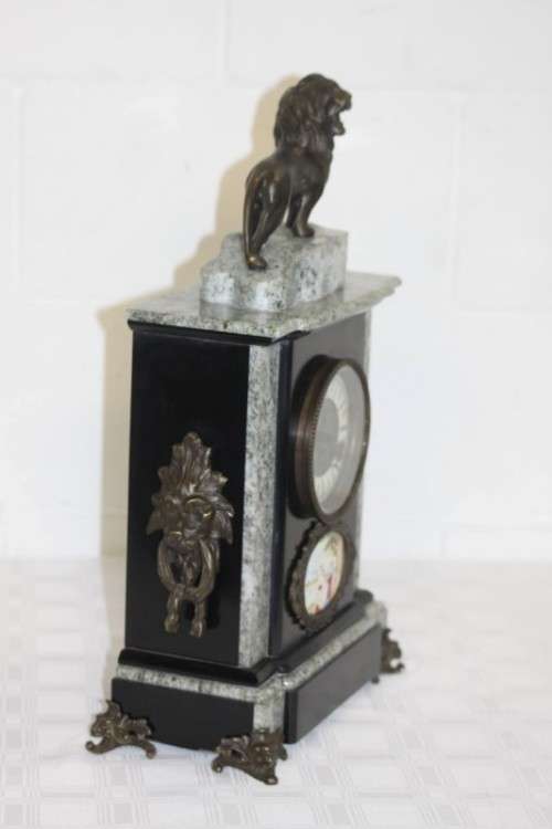 An incredible Italian grey granite & French black slate bronze Lion mantle clock