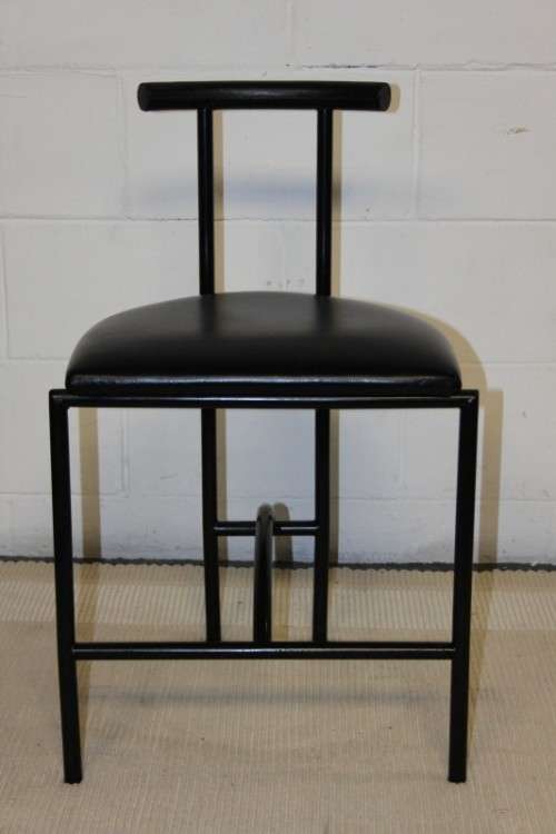 An awesome and sturdy black "Innovation" occasional chair with vinyl seat in great condition