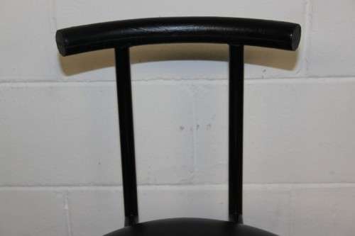An awesome and sturdy black "Innovation" occasional chair with vinyl seat in great condition