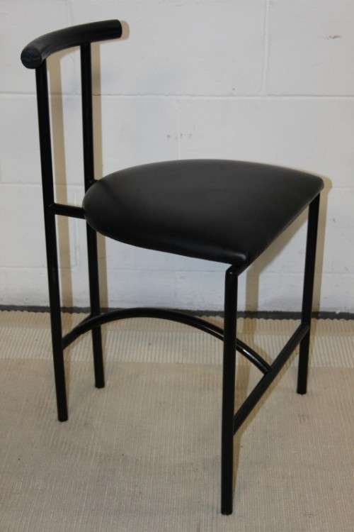 An awesome and sturdy black "Innovation" occasional chair with vinyl seat in great condition