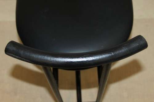 An awesome and sturdy black "Innovation" occasional chair with vinyl seat in great condition