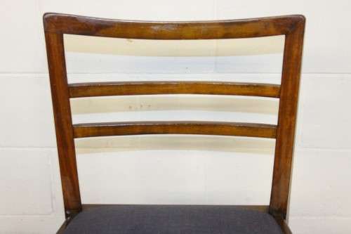 A very well made solid teak occasional chair with a upholstered seat in stunning condition