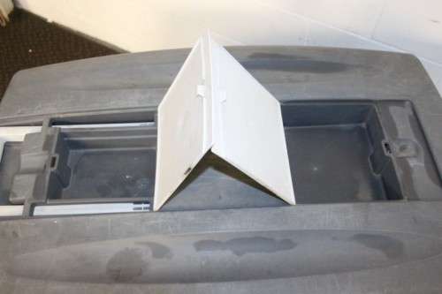 A large pet kennel/ travel case with two storage compartments on top