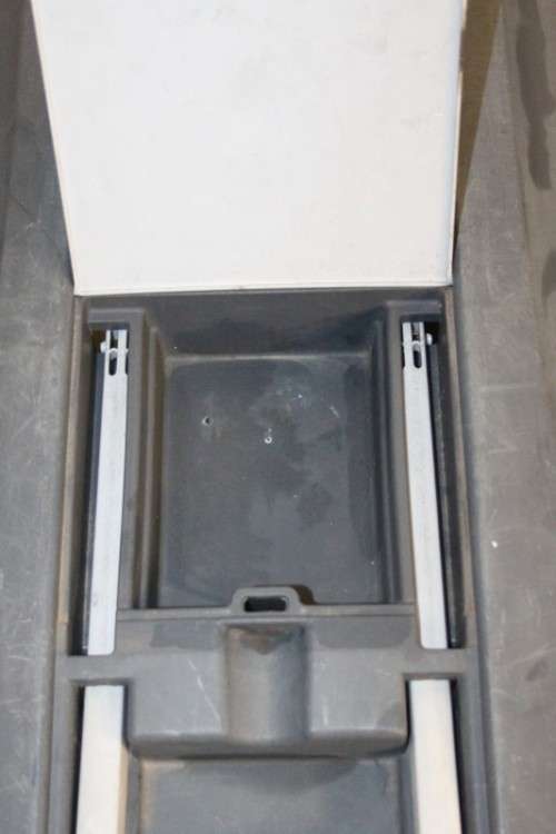 A large pet kennel/ travel case with two storage compartments on top