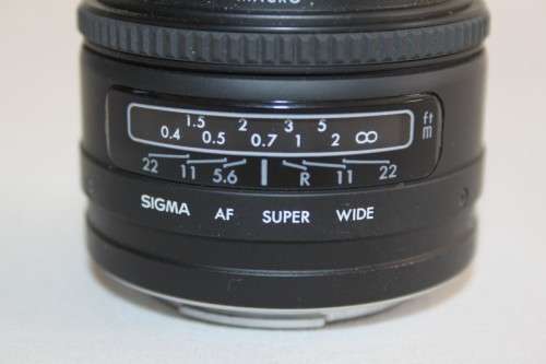 **RS17** A Sigma (for Minolta) Super-Wide II macro lens with its protective casing and lens hood