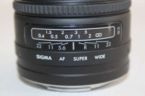 **RS17** A Sigma (for Minolta) Super-Wide II macro lens with its protective casing and lens hood