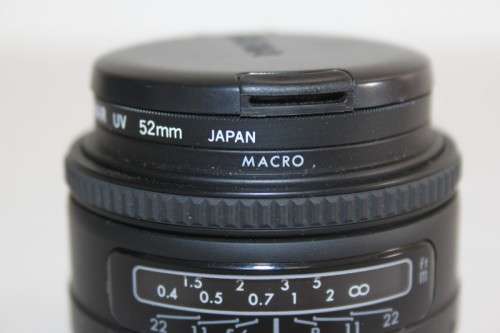 **RS17** A Sigma (for Minolta) Super-Wide II macro lens with its protective casing and lens hood