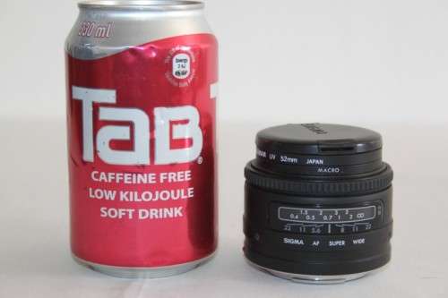 **RS17** A Sigma (for Minolta) Super-Wide II macro lens with its protective casing and lens hood