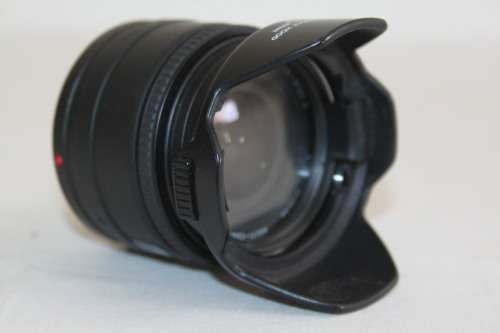 **RS17** A Sigma (for Minolta) Super-Wide II macro lens with its protective casing and lens hood