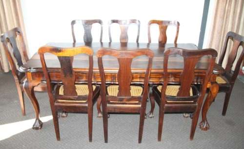 A spectacular solid stinkwood 8-seater dining suite with a separate table extension server - WOW!!!