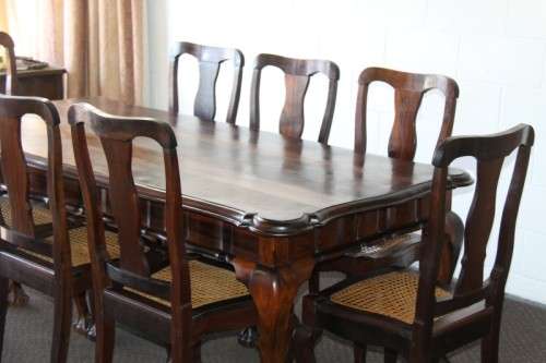 A spectacular solid stinkwood 8-seater dining suite with a separate table extension server - WOW!!!