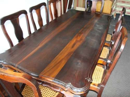 A spectacular solid stinkwood 8-seater dining suite with a separate table extension server - WOW!!!