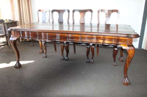 A spectacular solid stinkwood 8-seater dining suite with a separate table extension server - WOW!!!