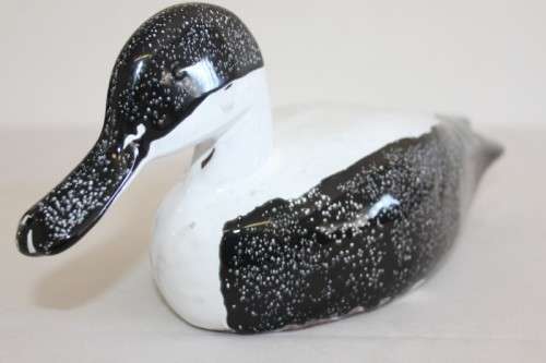 Three great ceramic/ pottery ornamental ducks including a Terracotta duck RS17Sale