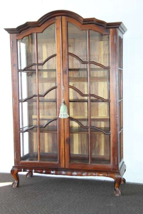 A gorgeous "gabled" display cabinet w/ large cottage pane doors & loads of space! Magnificent!!!
