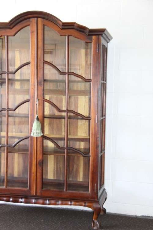 A gorgeous "gabled" display cabinet w/ large cottage pane doors & loads of space! Magnificent!!!