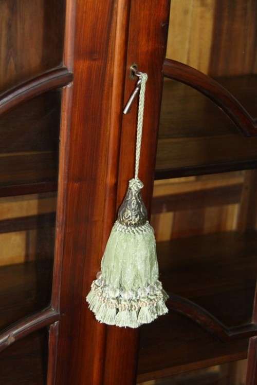 A gorgeous "gabled" display cabinet w/ large cottage pane doors & loads of space! Magnificent!!!