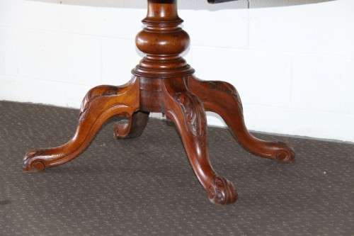 A magnificent antique carved oval Georgian Rosewood "tilt top" hall table in spectacular condition!