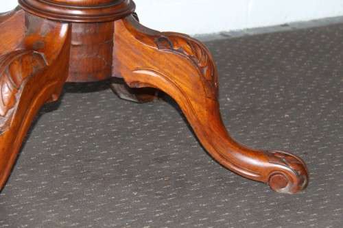 A magnificent antique carved oval Georgian Rosewood "tilt top" hall table in spectacular condition!
