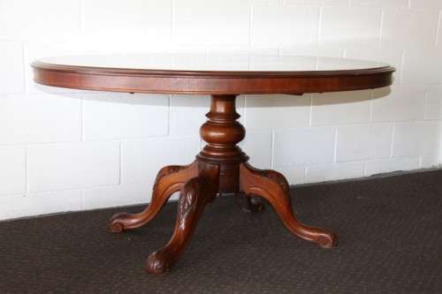 A magnificent antique carved oval Georgian Rosewood "tilt top" hall table in spectacular condition!