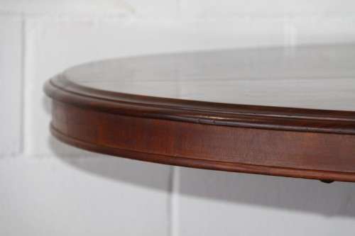 A magnificent antique carved oval Georgian Rosewood "tilt top" hall table in spectacular condition!