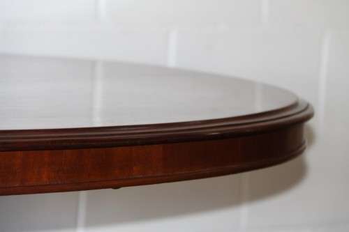 A magnificent antique carved oval Georgian Rosewood "tilt top" hall table in spectacular condition!