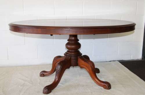 A magnificent antique carved oval Georgian Rosewood "tilt top" hall table in spectacular condition!