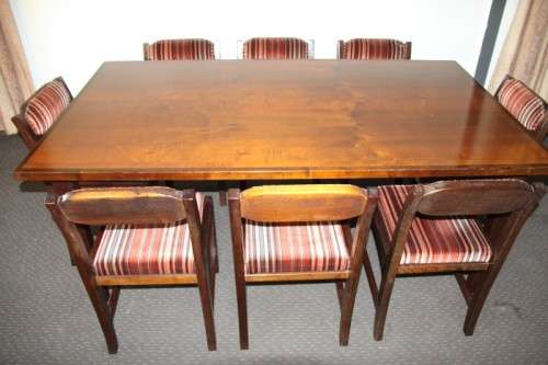 A stunning and beautifully upholstered vintage retro 8-seater dining suite in exquisite condition