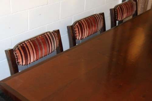 A stunning and beautifully upholstered vintage retro 8-seater dining suite in exquisite condition