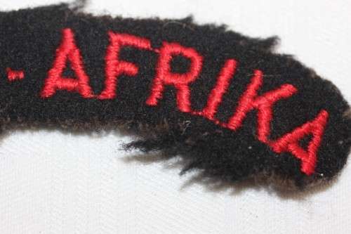 A military black and red "Suid-Afrika" patch in good condition