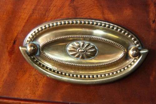 A magnificent Kingswood finished Regency buffet/ side server with spade feet and a curved front