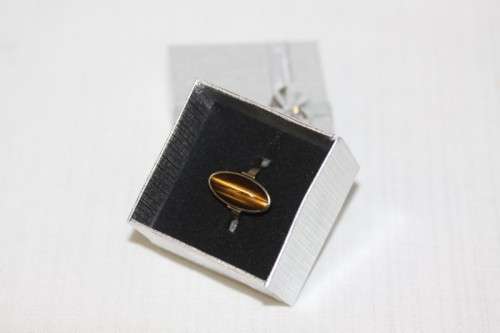 An exquisite vintage 9ct yellow gold ladies "oval" setting tigers eye ring by Birger Haglund