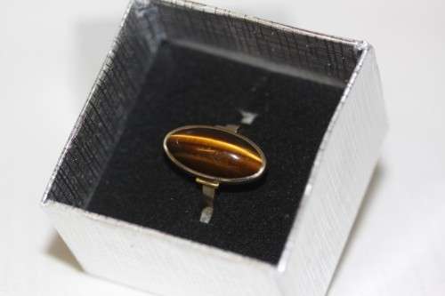 An exquisite vintage 9ct yellow gold ladies "oval" setting tigers eye ring by Birger Haglund