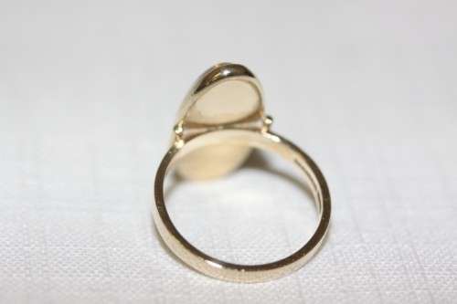 An exquisite vintage 9ct yellow gold ladies "oval" setting tigers eye ring by Birger Haglund