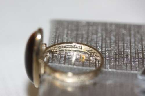 An exquisite vintage 9ct yellow gold ladies "oval" setting tigers eye ring by Birger Haglund